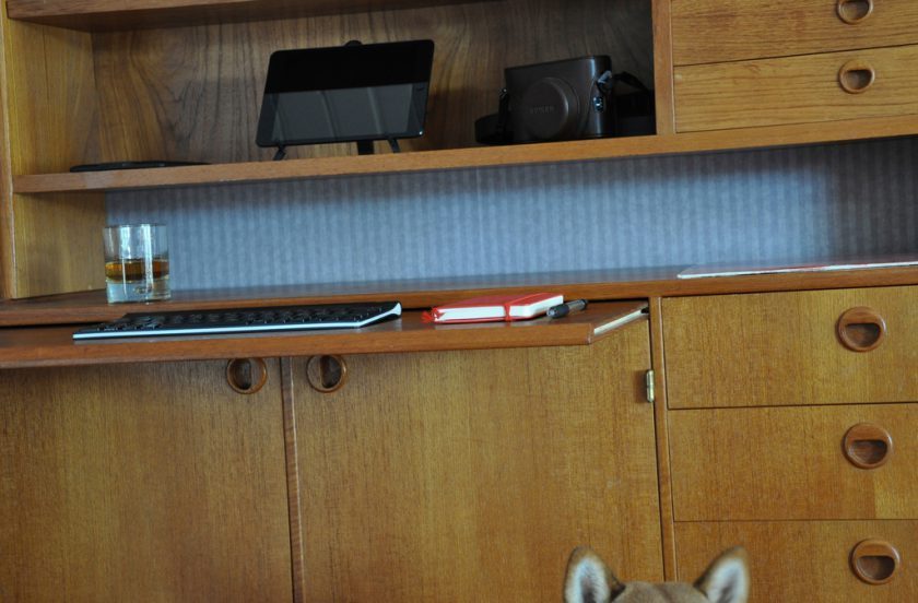 The writing shelf, featuring Paazu the shiba inu. Annotated on Flickr.